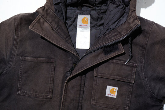 Kent, uk 01.01.2024 Carhartt WIP work in progress Siberian Faux Fur Trim Hood Winter Parka jacket rustic black Extreme weather condition waterproof windproof coat.