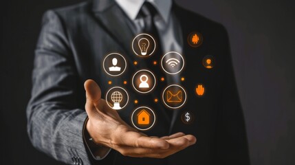 Businessman in formal suit showing digital network connections icons. Symbolizing technology integration, networking, innovation, and internet of things. Light effects and futuristic concept.