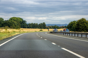 Fototapeta premium A Typical View From A Vehicle Travelling Along A Motorway Road In The United Kingdom