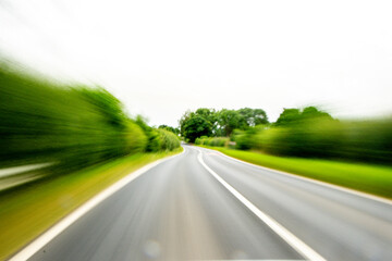Fototapeta premium A Typical View From A Vehicle Travelling Along A Countryside Road In The United Kingdom