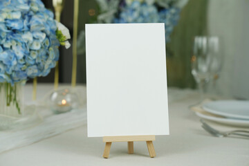 Blank card mockup for wedding invitations, place cards, table numbers, or menus. Set against a...