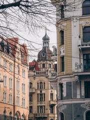 Fototapeta premium Street in the center of Riga in early spring. Architecture of Latvian capital