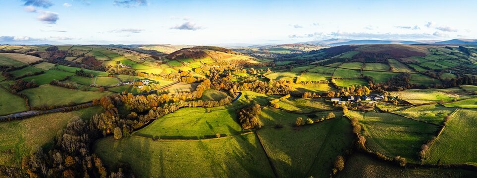 Farms over Trecastle from a drone at sunset, Brecon Beacons National Park, Powys, Wales, England