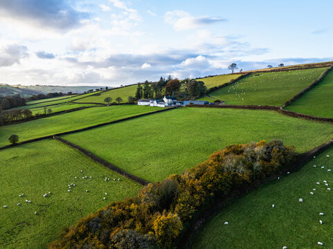 Farms over Trecastle from a drone at sunset, Brecon Beacons National Park, Powys, Wales, England