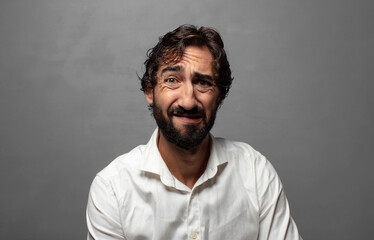 Fototapeta premium feeling sad and whiney with an unhappy look, crying with a negative and frustrated attitude