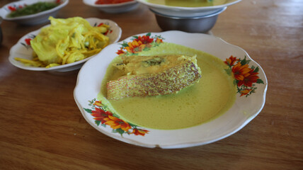 Yellow Fish Curry or Gulai Kuning Ikan, is a typical dish of West Sumatra, Indonesia. Fish with yellow base seasoning plus coconut milk. Spicy, sour and savory taste.