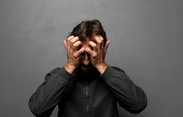 panicking over a forgotten deadline, feeling stressed, having to cover up a mess or mistake