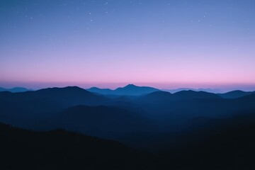 Mountain Silhouette at Night: A black silhouette of mountains with a soft gradient sky transitioning from navy blue to violet, featuring faint stars