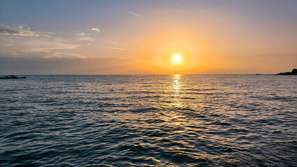 Fototapeta premium sunset by the Adriatic Sea in Poreč, Croatia