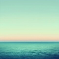 Obraz premium A serene seascape featuring calm turquoise waters meeting a soft pastel sky, evoking a sense of tranquility and peacefulness in a minimalist composition.