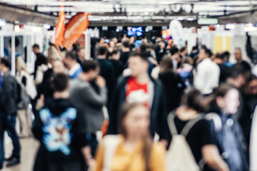 Abstract blurred people at exhibition hall of expo event trade show. Business convention show or job fair. Business concept background