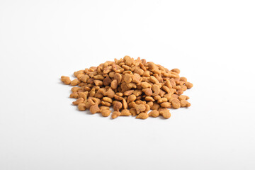 Dry Cat Food isolated on white background. Pile of animal feed. Dry pet food