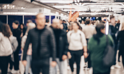 Abstract blurred people at exhibition hall of expo event trade show. Business convention show or job fair. Business concept background