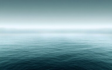 Obraz premium A serene view of calm ocean waters stretching into the horizon, captured in tranquil shades of teal and soft gray, evoking a sense of peace and solitude.