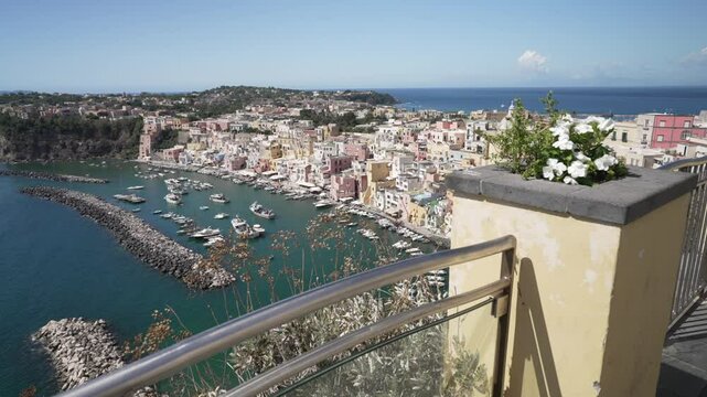 View of Marina di Corricella and Santa Maria delle Grazie Church, Procida, Phlegraean Islands, Gulf of Naples, Campania, Southern Italy, Italy