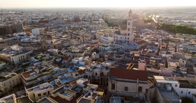 Sunny Sunset Over City Of Bari With Cathedral of Saint Sabinus In View. Apulia, Italy. aerial ascend