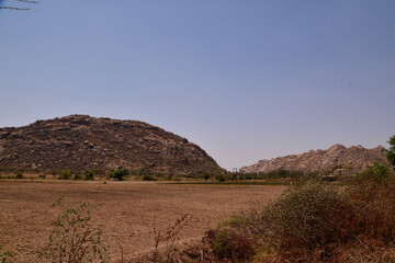Hot Hill Landscape Under Intense Sunlight