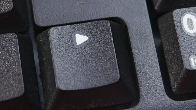 Right Arrow Key on Desktop Keyboard Pressed by Finger Hand Multiple Times - Close Up Macro Shot
