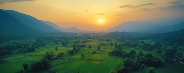 Obraz premium Beautiful golden hour lighting over a lush green landscape, warm sunset painting the sky, vibrant nature scene in rural settings, springsummer video style