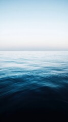 Obraz premium A tranquil gradient of blues, creating a serene underwater or atmospheric landscape.