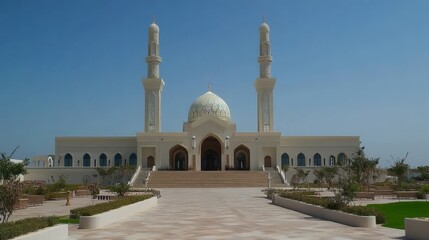Majestic Mosque with Twin Minarets and Dome under Clear Blue Sky