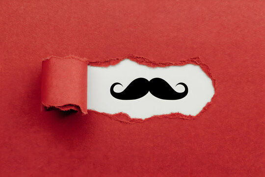 Torn red paper reveals white surface beneath quirky mustache graphic contrasts design. - Powered by Adobe