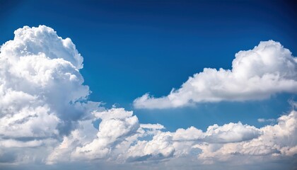 White Fluffy Clouds on Blue Sky in Summer: Nature Background and Cloudscape