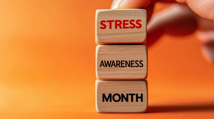 Stress awareness month symbol. Wooden blocks with words 'Stress awareness month'. Beautiful white background