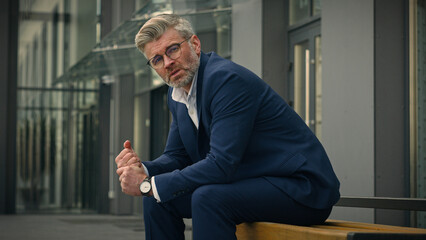 Pensive sad worried sorrowful thoughtful middle-aged man senior mature business employer...