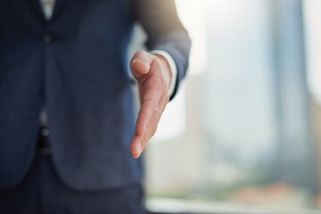 Fototapeta premium Business, office and showing hand for greeting with welcome, hello and introduction for meeting. Professional, employee and handshake gesture at workplace for congratulations, agreement and thank you