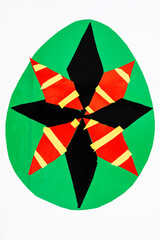 Colorful geometric abstract design with star shapes on green background