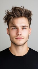 Fototapeta premium A man with a shaved head and a beard