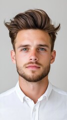 Fototapeta premium A man with a shaved head and a beard