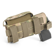 Holster for gun. Weapon in a holster on a white background. Tactical military ammunition.
