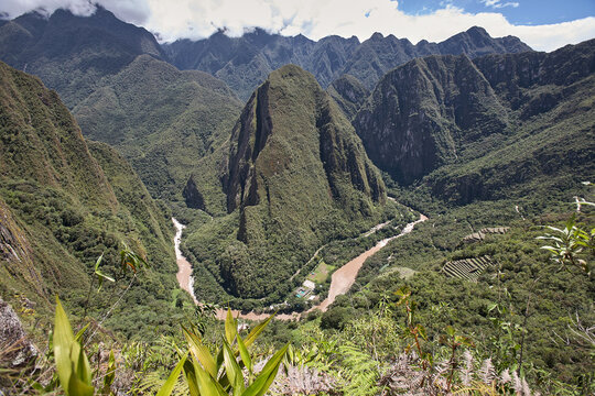 Behold the majestic Apu Putu Cusi Guardian of the Sacred Valley, this powerful mountain stands tall, carrying deep spiritual significance in Andean culture. MAchu Pichu Peru