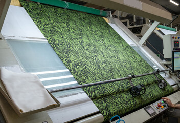 Fabric machine industrial plant line in a textile factory.