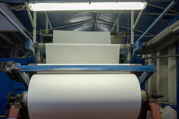 Fabric batching process machine industrial plant line in a textile factory.