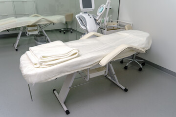 Empty Spa Treatment Bed in Modern Aesthetic Clinic