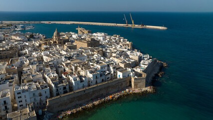 Aerial view of the city walls that surround the historic center of Monopoli, in the province of...