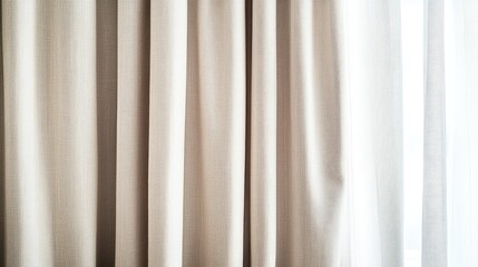 Obraz premium Light tan blackout curtain with eyelet rings, set against a bright white background. Neutral, functional, and stylish.