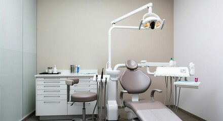 Modern dental clinic interior with teal accents and comfortable chair