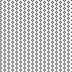 Seamless polka dot pattern featuring small black dots scattered across a white background 