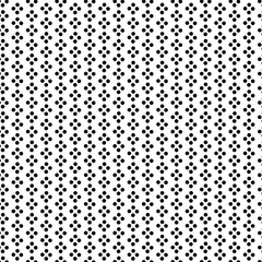 Seamless polka dot pattern featuring small black dots scattered across a white background 
