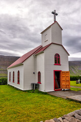 Isafjordur, Iceland - August 11, 2024: Exteriors of the stolen church and cemetery in Sudavik in...