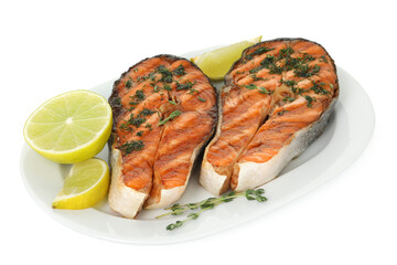Tasty grilled salmon steaks with thyme, dill and lime isolated on white