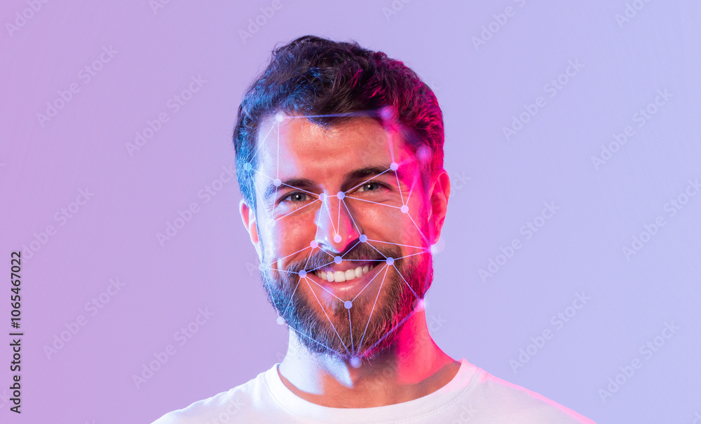 Poster A smiling man is illuminated with colorful lights, showcasing facial recognition patterns on his face. This image highlights the intersection of technology and human expression.