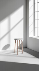 Minimalistic stool in a brightly lit room with shadows and natural light.