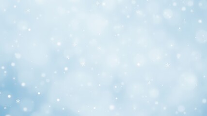 A delicate snowfall against a blurred blue background, perfect for winter-themed designs and festive creations.