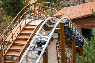 Rollercoaster Track Stairs Wooden Structure - A close-up of a wooden rollercoaster track with...