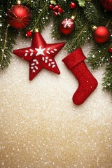 Festive Christmas background with red stocking, ornaments, pinecones.